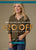 Two women wearing clothing with a promotional banner offering $20 off $100+ with code: HOTSALE20. Excludes clearance.