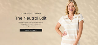 A smiling woman stands against a warm beige textured background wearing a cream and white horizontally striped short-sleeve polo shirt. Text on the left reads 'ELEVATED ESSENTIALS The Neutral Edit' with a 'SHOP NEUTRALS' button below.
