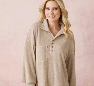 Rotating GIF of models various models wearing fall outfits. 