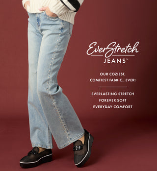 Model wearing light denim jeans with studs along the side on a maroon background with copy 'EVERSTRETCH JEANS'