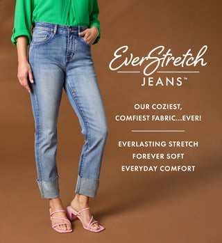 Person wearing light denim jeans on brown background with promotional 'EverStretch' jeans text